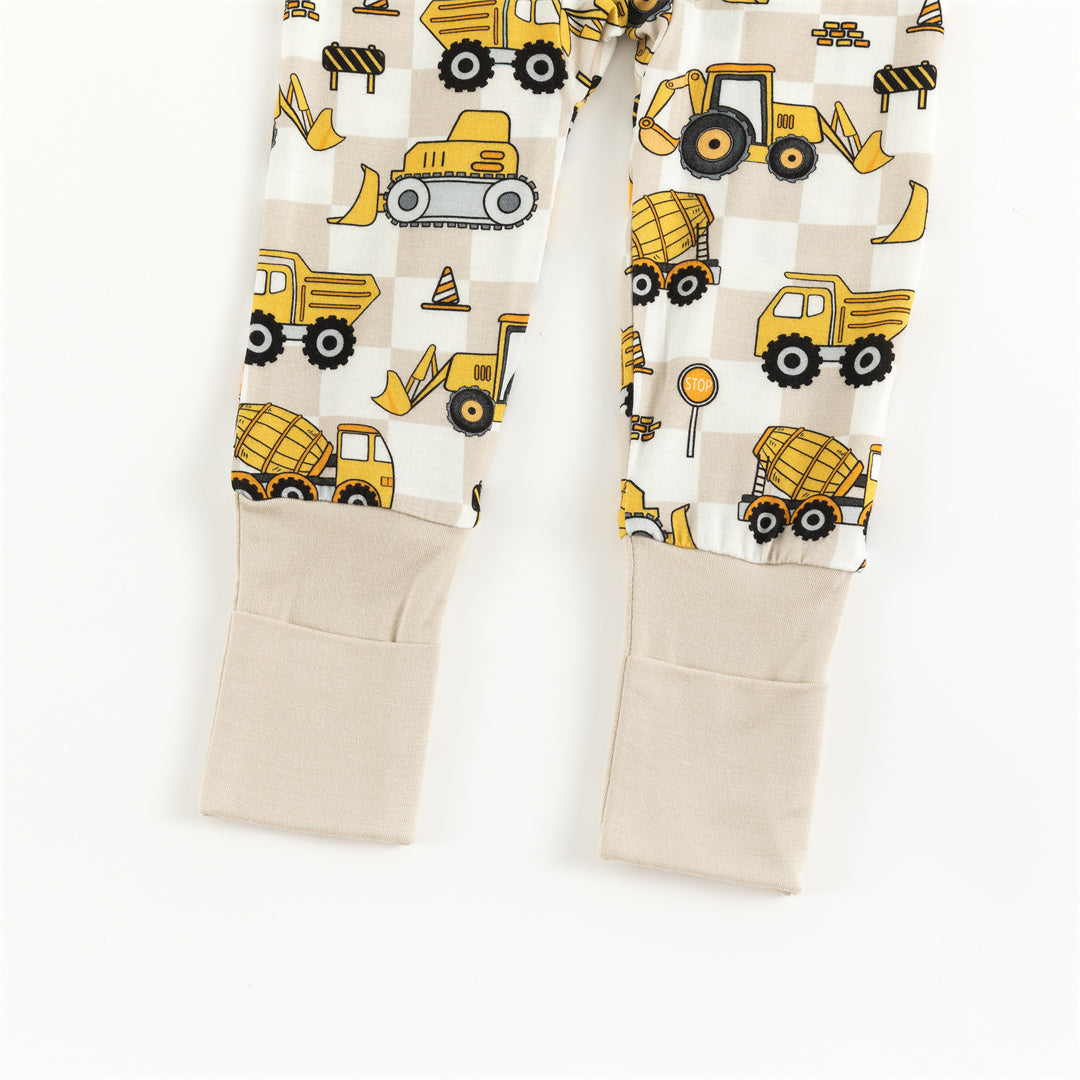 Pyjama zippé en bambou pour bébé avec motif camion à carreaux