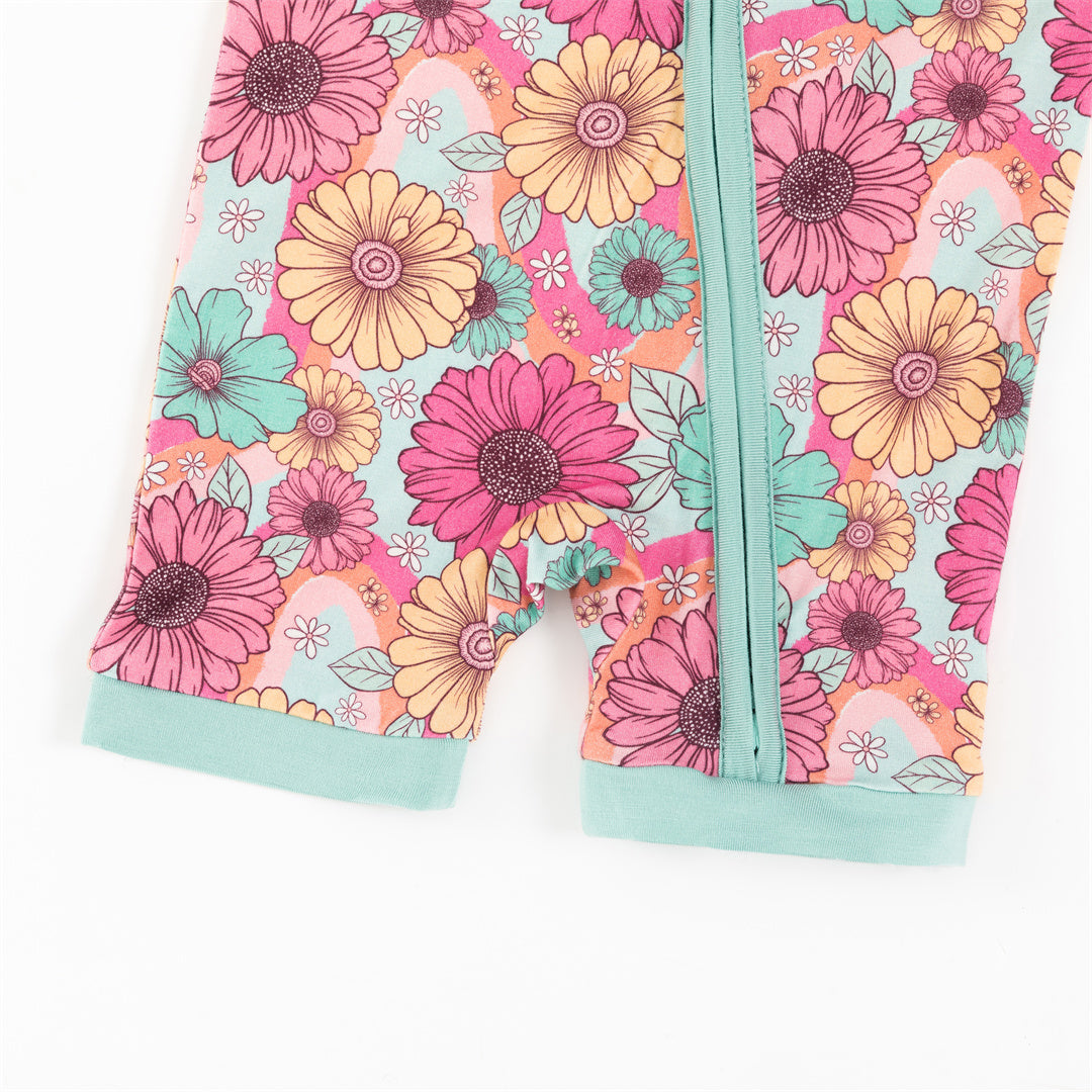 Pyjama court zippé en bambou coloré à fleurs pour bébé