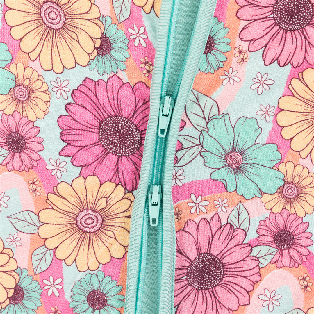 Pyjama court zippé en bambou coloré à fleurs pour bébé