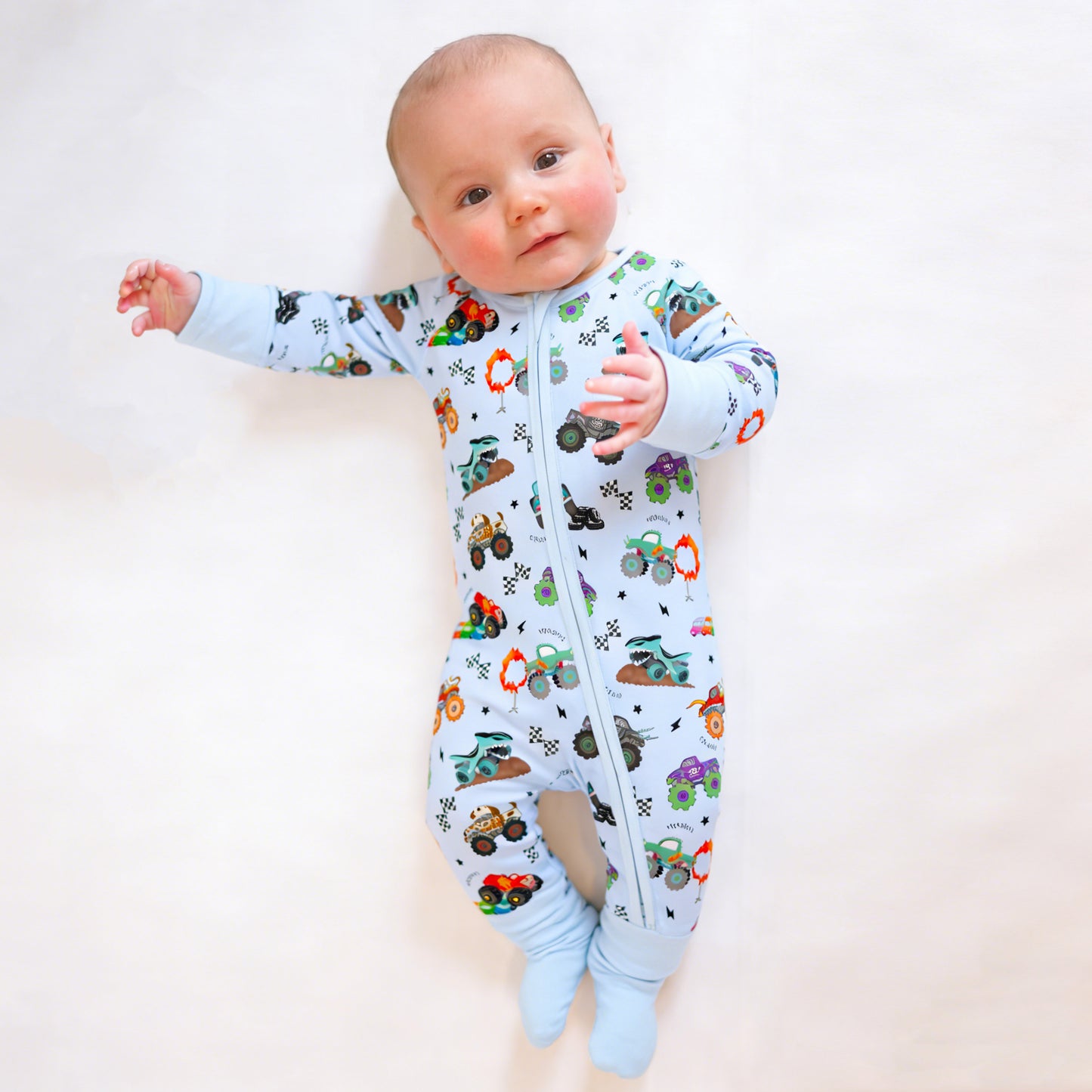 Big Wheels Truck Race Journey on Blue Bamboo Zipper Romper Pajamas