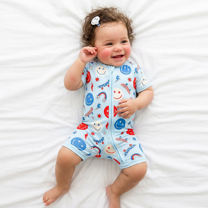 4th of July Smiley Faces and Colorful Rainbows Sky Blue Short Bamboo Zippy Baby Romper