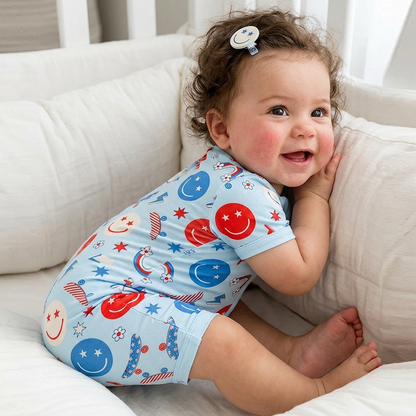 4th of July Smiley Faces and Colorful Rainbows Sky Blue Short Bamboo Zippy Baby Romper